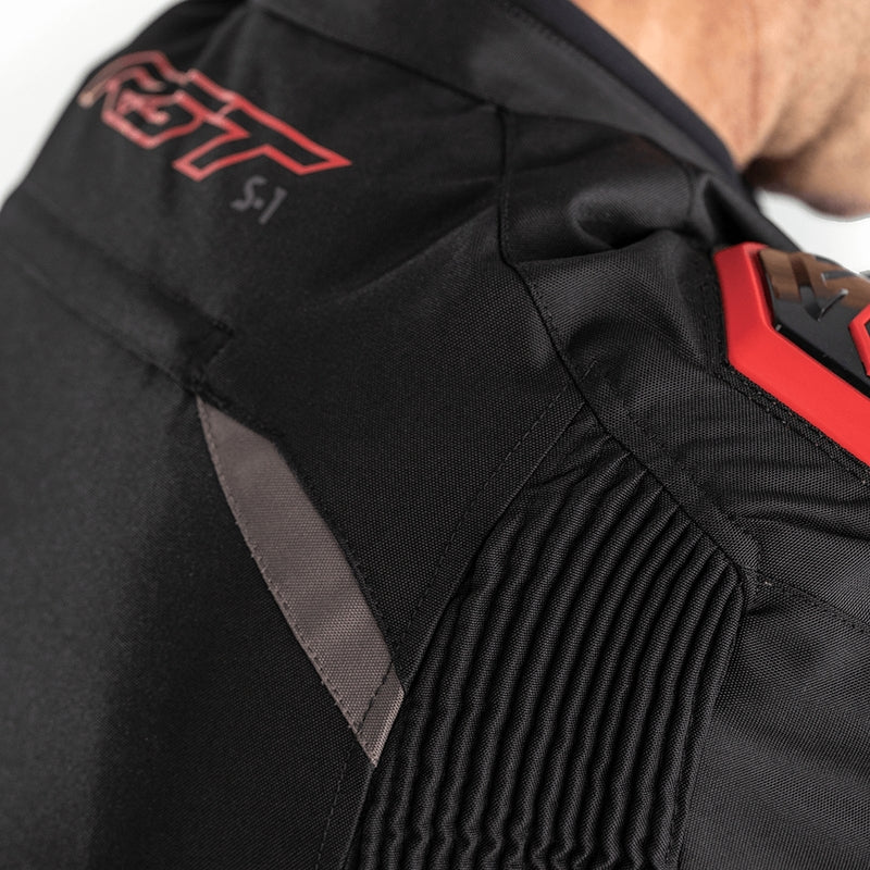        With its futuristic style, the S-1 textile jacket is a bold and vibrant take on protective motorcycling apparel, built to perform.  Made from robust MaxTex fabric, the jacket also features fixed mesh and SinAqua waterproof linings, a removable thermal lining and multiple intake and exhaust vents to protect you from all the elements.  Added to this are the motion panels on the back of the elbow and arm, along with cuff, sleeve and waist adjusters which offer a tailored fit.  Rated CE Level