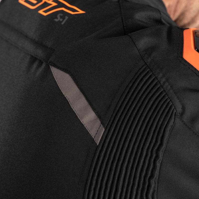        With its futuristic style, the S-1 textile jacket is a bold and vibrant take on protective motorcycling apparel, built to perform.  Made from robust MaxTex fabric, the jacket also features fixed mesh and SinAqua waterproof linings, a removable thermal lining and multiple intake and exhaust vents to protect you from all the elements.  Added to this are the motion panels on the back of the elbow and arm, along with cuff, sleeve and waist adjusters which offer a tailored fit.  Rated CE Level