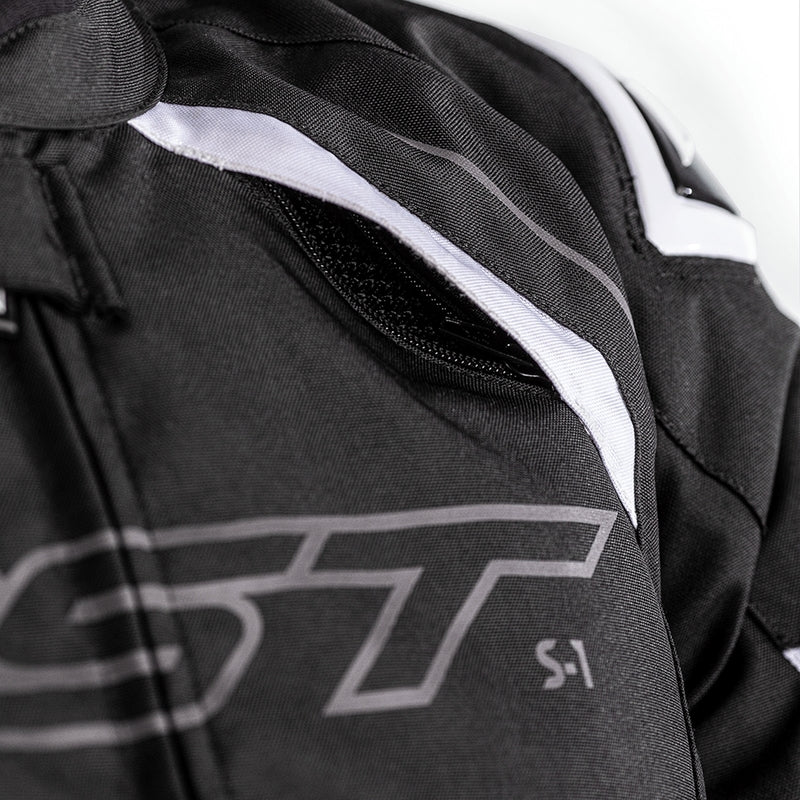        With its futuristic style, the S-1 textile jacket is a bold and vibrant take on protective motorcycling apparel, built to perform.  Made from robust MaxTex fabric, the jacket also features fixed mesh and SinAqua waterproof linings, a removable thermal lining and multiple intake and exhaust vents to protect you from all the elements.  Added to this are the motion panels on the back of the elbow and arm, along with cuff, sleeve and waist adjusters which offer a tailored fit.  Rated CE Level