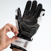 
Built with Aramide - TracTech Evo 4 glove combines the best of previous TracTech gloves with more features for a superb fit, comfort and protection.

Made with both full-grain cowhide and kangaroo leather, the glove features a CE Level 1 Carbon Knuckle Protector for impact protection. Aramide Fibre on the palm stitching and underlay, along with double layer kangaroo leather and an RST palm slider protect the palm in the event of a high speed slide, while the double wrist and cuff closure offe