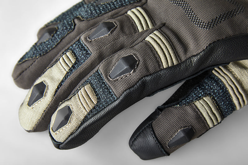 
The Ranger Jacket and Jean took adventure riding to a new level, and now we are introducing the Pro Series Ranger Glove to match. Using a blend of materials and protective features, including the RST palm slider and integrated TPU knuckle protector, the Ranger Glove will keep you riding in the toughest conditions.

ARMOUR

CE Certification Rating: Level 1 KP
Cordura covered TPU knuckle
TPR finger protection
TPR Palm slider


CONSTRUCTION

Outer 1: Cordura
Outer 2: Full grain leather
Outer 3: